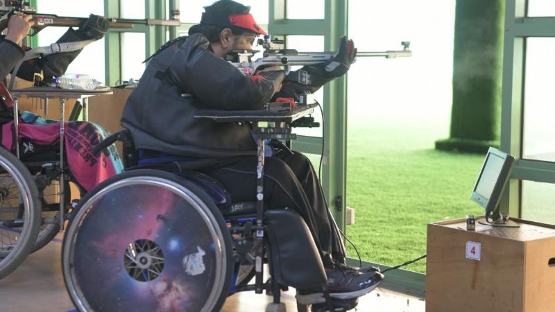 A rifle shooter in a wheelchair 